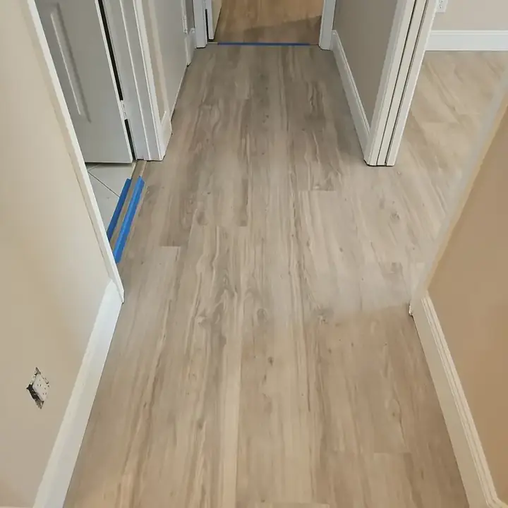 New plank floor down a hallway