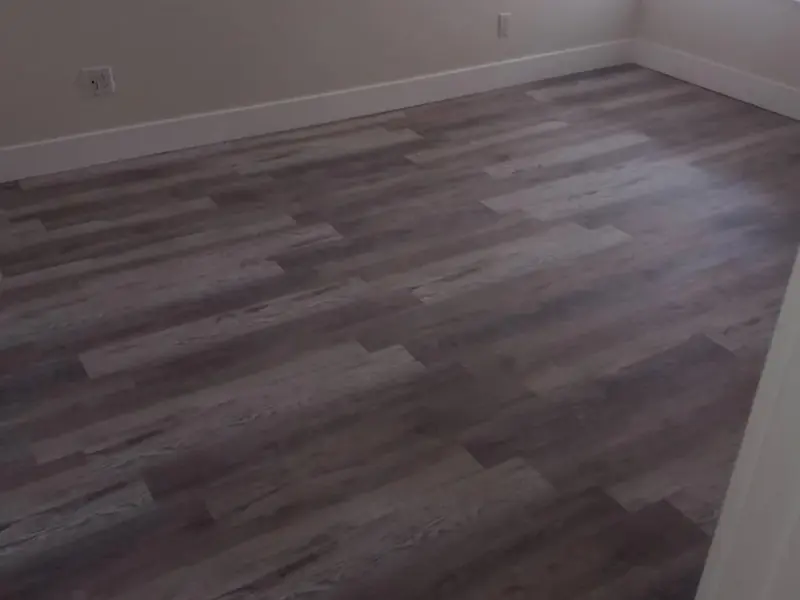 New wood-look plank floors in an empty room